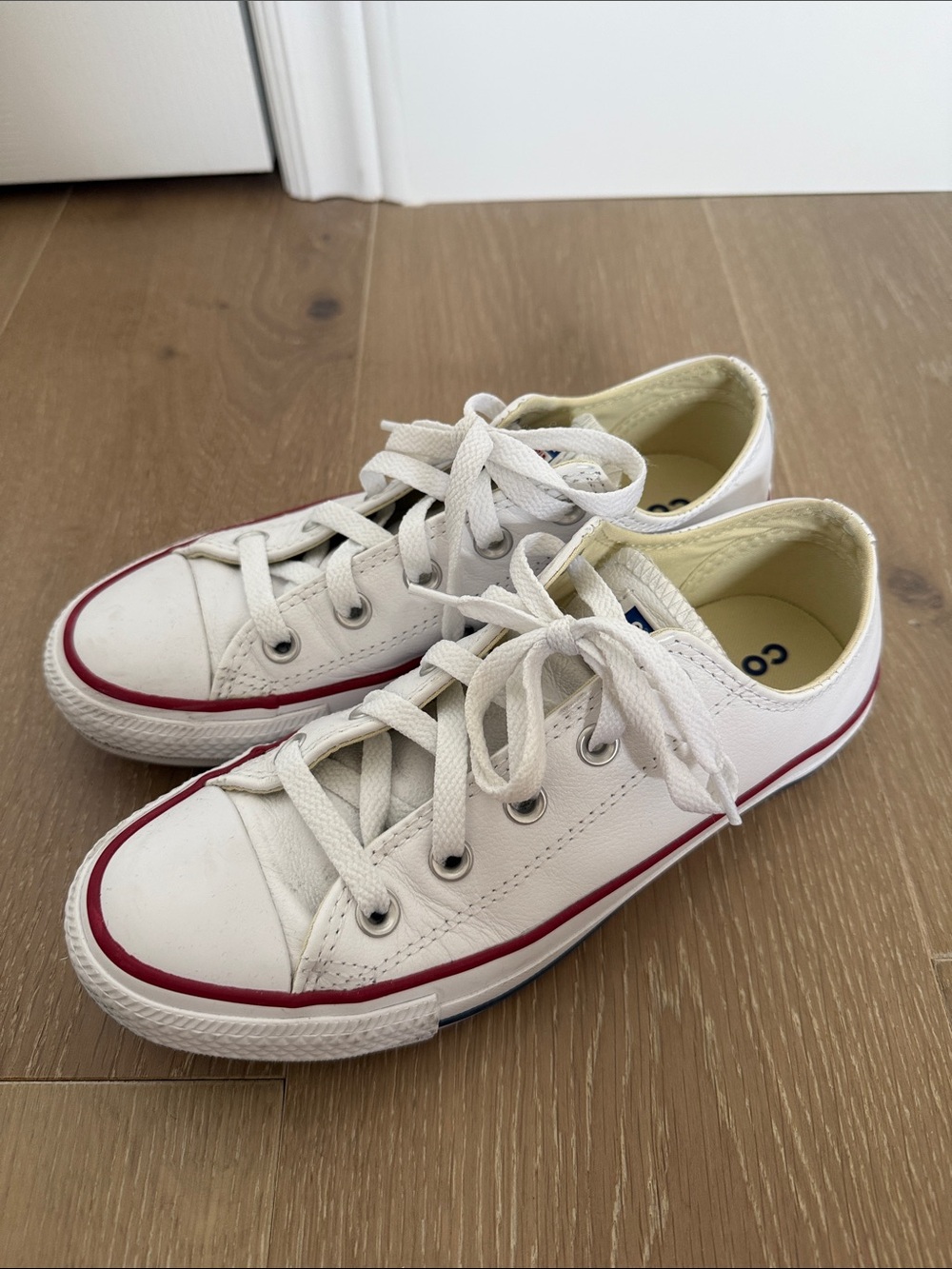 White Low-Top Sneakers with Red Trim - Women's Casual Lace-Ups